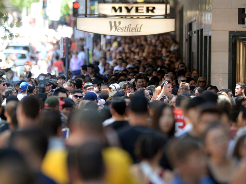 Australian consumers at the Pitt Street mall, in Sydney, Friday, Dec. 26, 2014. Consumers are expected to spend more an estimated $2.07 billion dollars in retail sales across Australia today. (AAP Image/Sam Mooy) NO ARCHIVING
